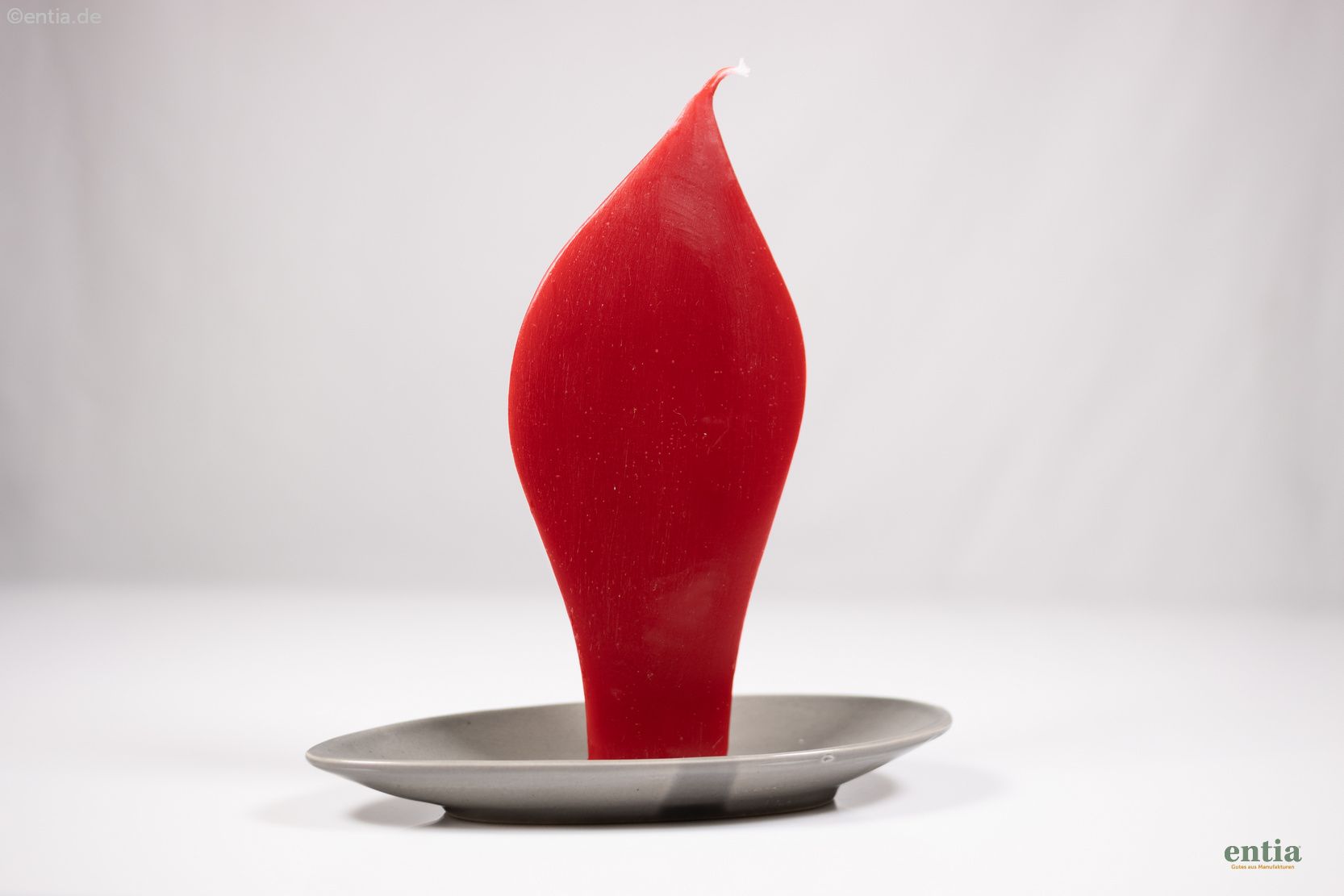 Rote Engelkerze mit grauem Keramik-Halter 