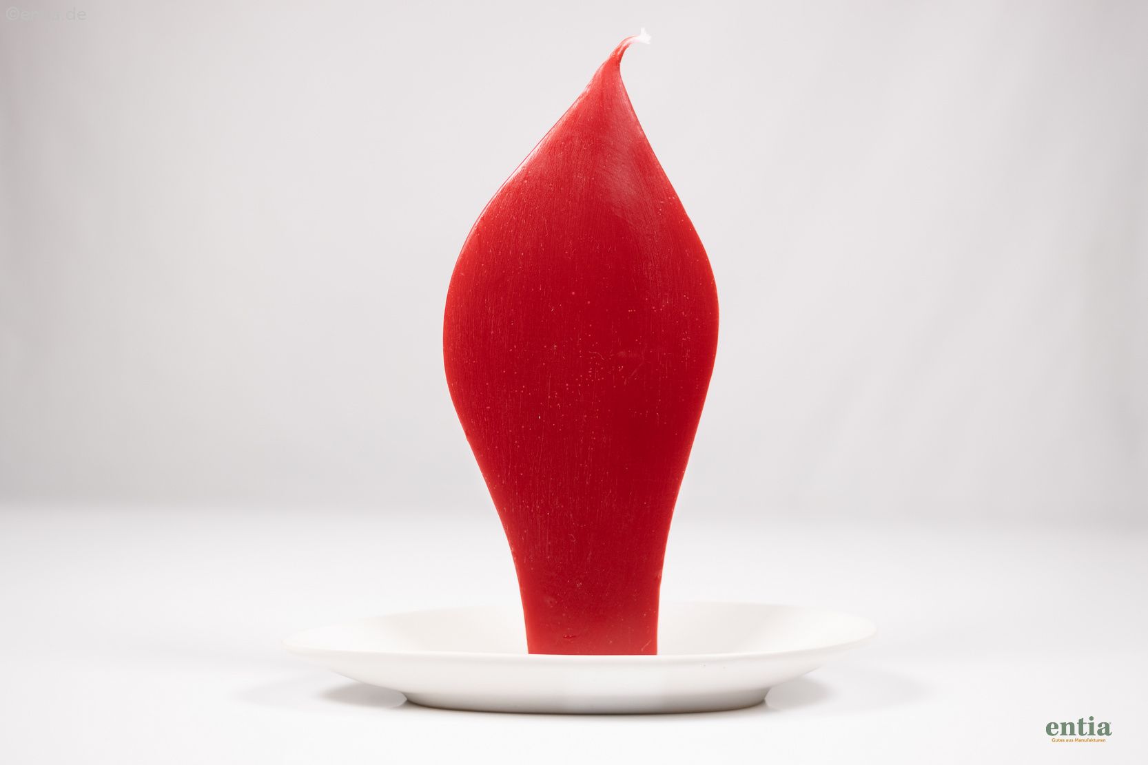 Rote Engelkerze mit weißem Keramik-Halter 