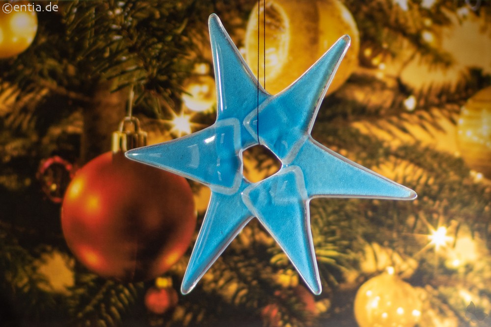 Weihnachtsdeko Stern mittel aus hellblauem Glas 