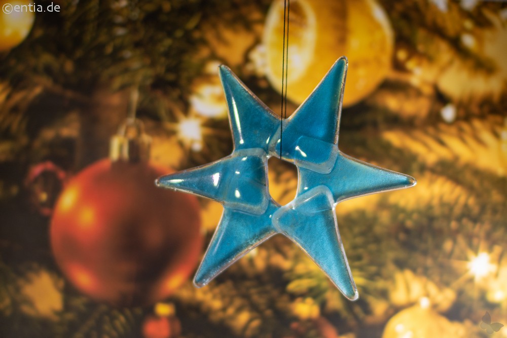 Weihnachtsdeko Stern klein aus hellblauem Glas 